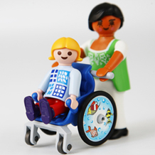 Kind im Rollstuhl