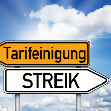 Tarifverhandlung Tarifeinigung oder Streik Richtungsschilder