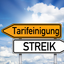 Tarifverhandlung Tarifeinigung oder Streik Richtungsschilder